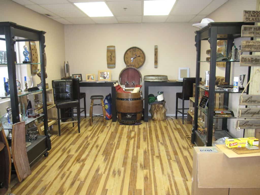 Before and after pictures of First Class Engraving Showroom
