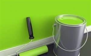 Picture of Green colored wall paint and paint bucket