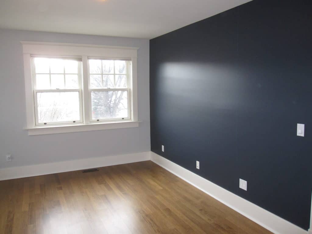 Dark Navy Blue Accent Wall in a bedroom