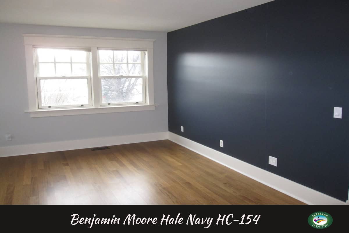 Bedroom with blue accent wall Hale Navy