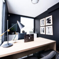 beautiful office painted with dark blue walls