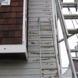 Peeling paint on Hardie Board